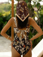 Load image into Gallery viewer, Women’s Black and Brown Floral Print Criss-Cross One-Piece Swimsuit and Sheer Sarong Set