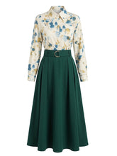 Load image into Gallery viewer, Woman wearing vintage floral blouse and green high-waist midi skirt