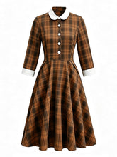 Load image into Gallery viewer, Vintage brown plaid midi dress with white peter pan collar, white sleeve cuffs, and front buttons