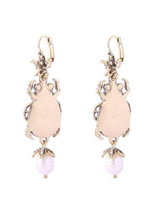 Bettle Juice Earrings With Pearl Star 